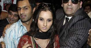 Shoaib, Sania reach India